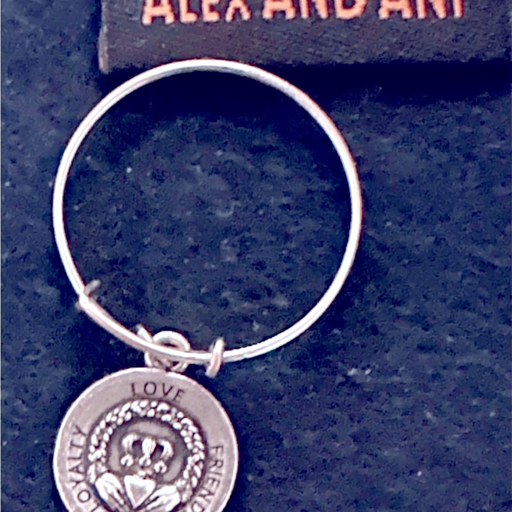 Adjustable Alex and Ani Claddagh ring worn twice comes with original pouch!